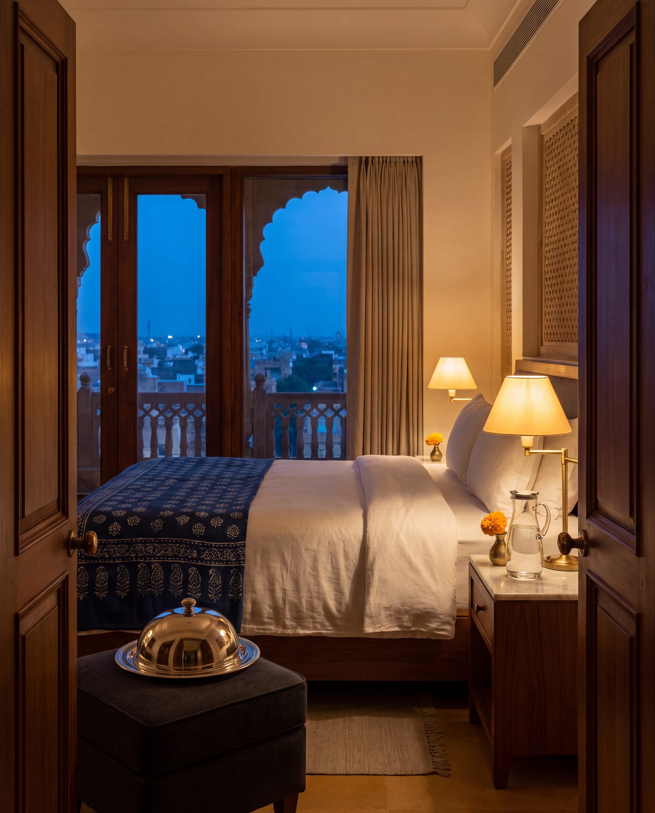 A guest room prepared with a late supper before arrival